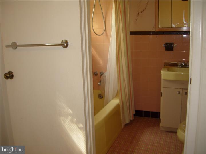 628 Mill Road Trevose, PA 19053 - Photo 15 of 18 a bathroom with a shower