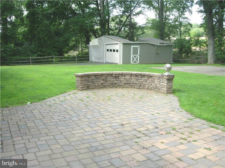 628 Mill Road Trevose, PA 19053 - Photo 5 of 18 a view of a house with a yard