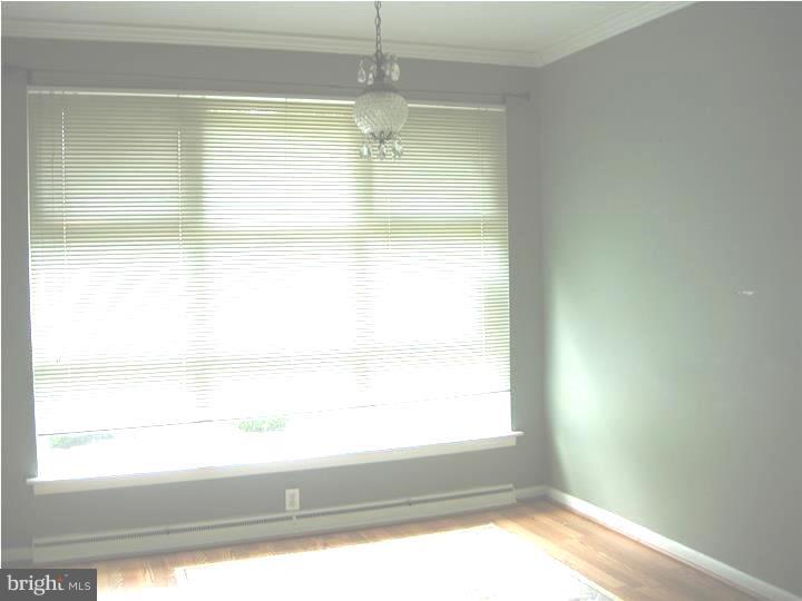 628 Mill Road Trevose, PA 19053 - Photo 8 of 18 a bathroom with a window and a shower