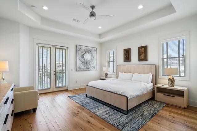 a bedroom with a large bed and a couch