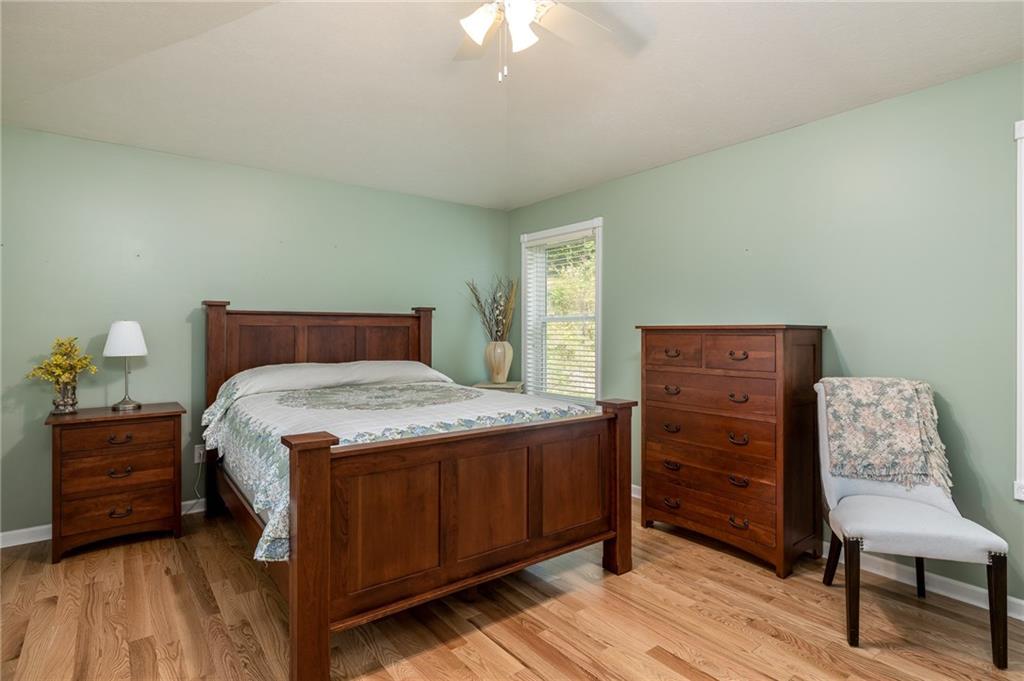 206 McCombs Road Venetia, PA 15367 - Photo 11 of 25 Master bedroom retreat features red oak floors, vaulted ceiling and private master bath