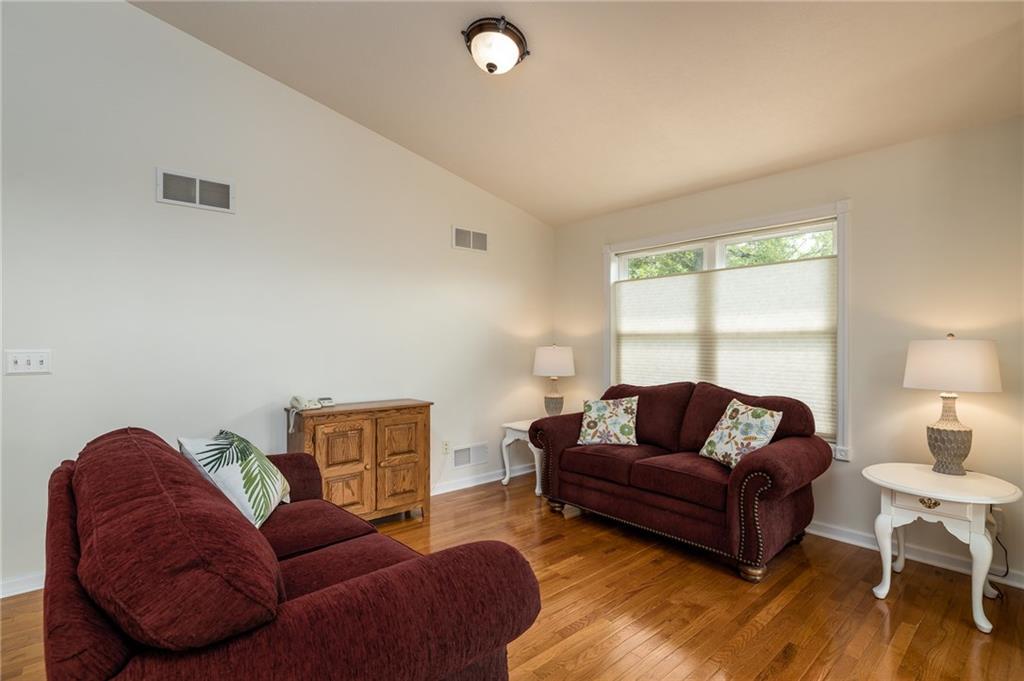 206 McCombs Road Venetia, PA 15367 - Photo 3 of 25 Living room with hardwood floors and vaulted ceilings