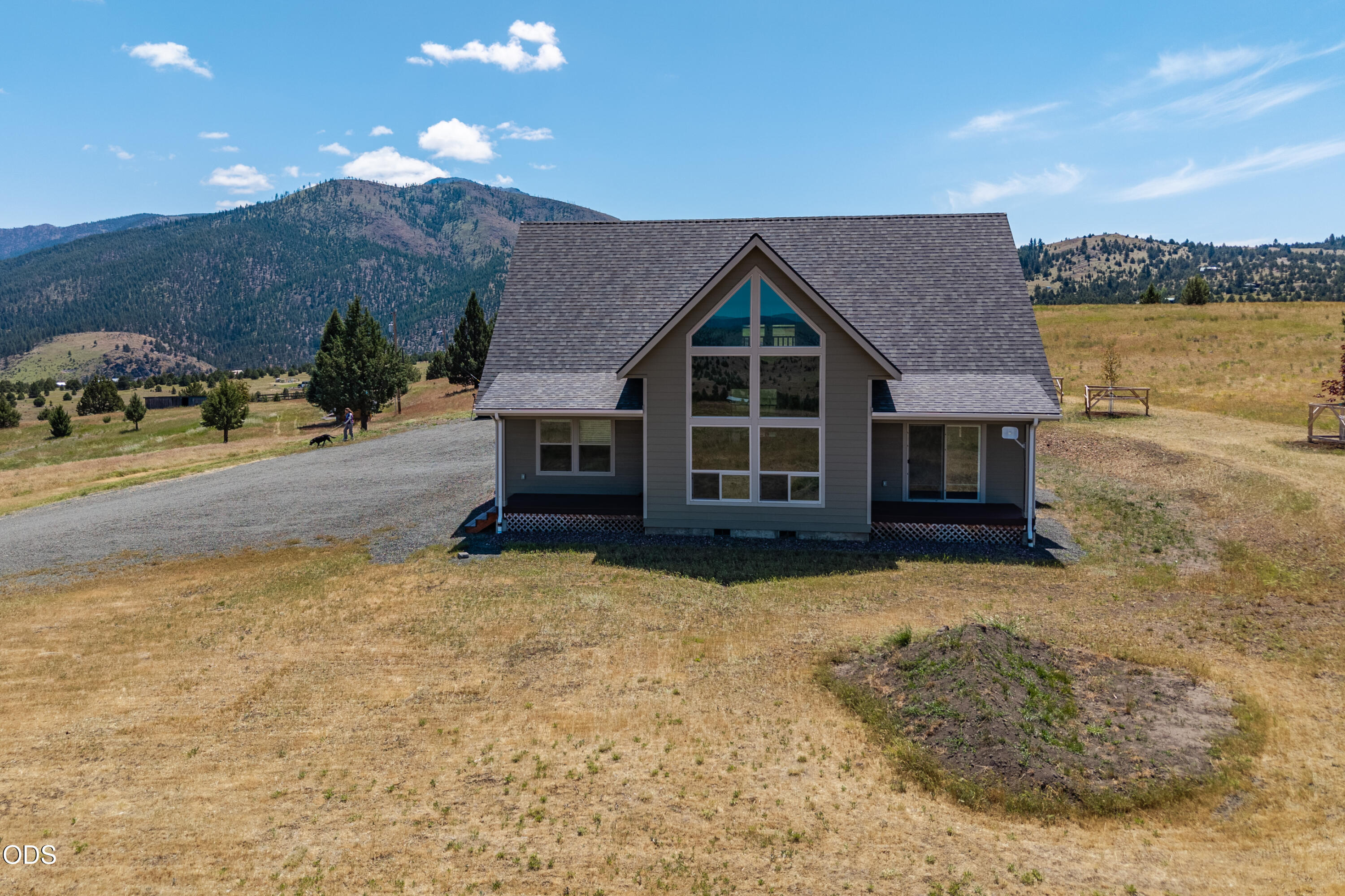 26216 West Bench Road John Day, OR 97845 - Photo 50 of 53 a view of a house with a yard