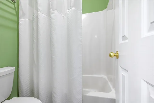 a bathroom with a sink and toilet