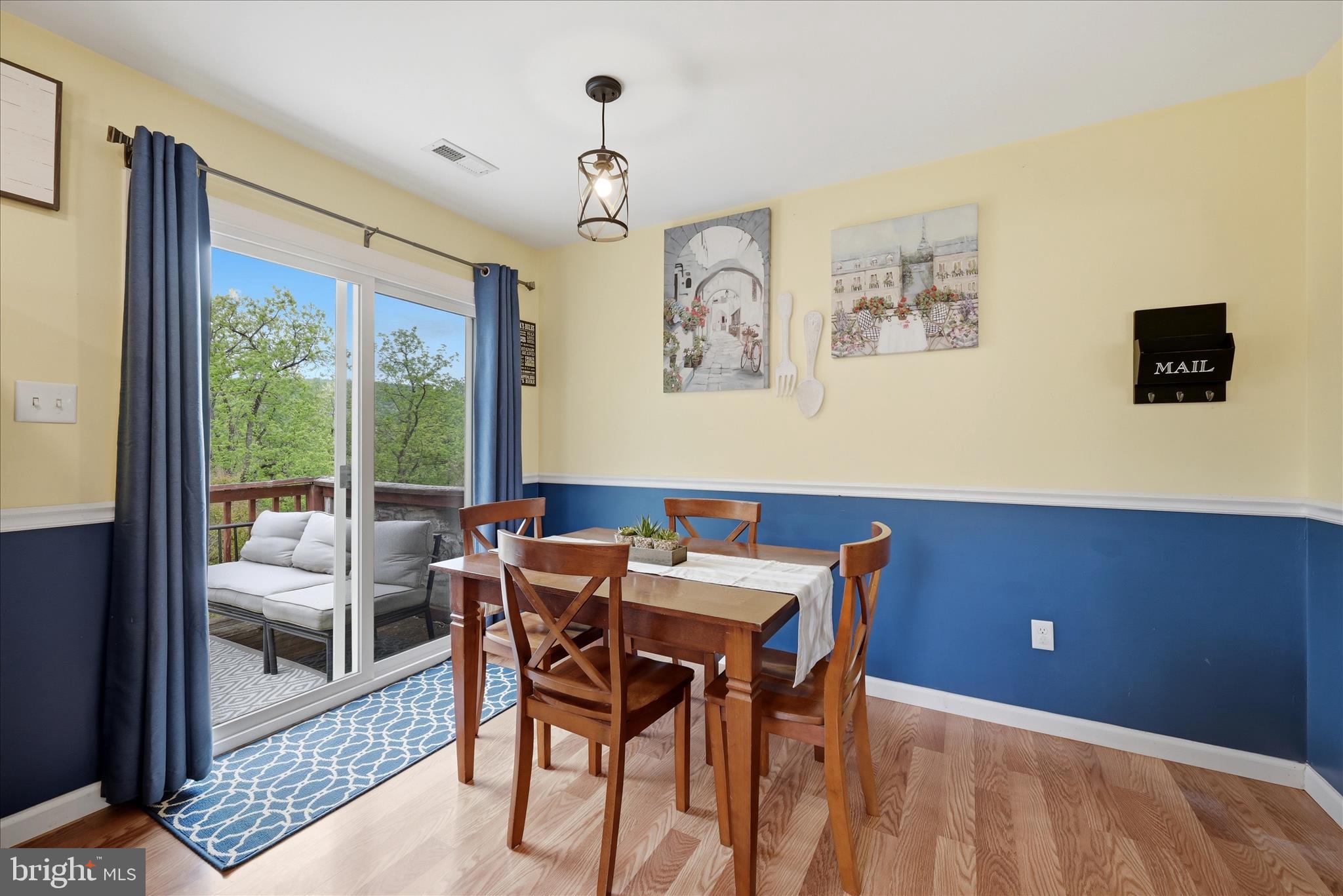 91 Granny Smith Road Linden, VA 22642 - Photo 17 of 65 a view of a dining room with furniture and a window