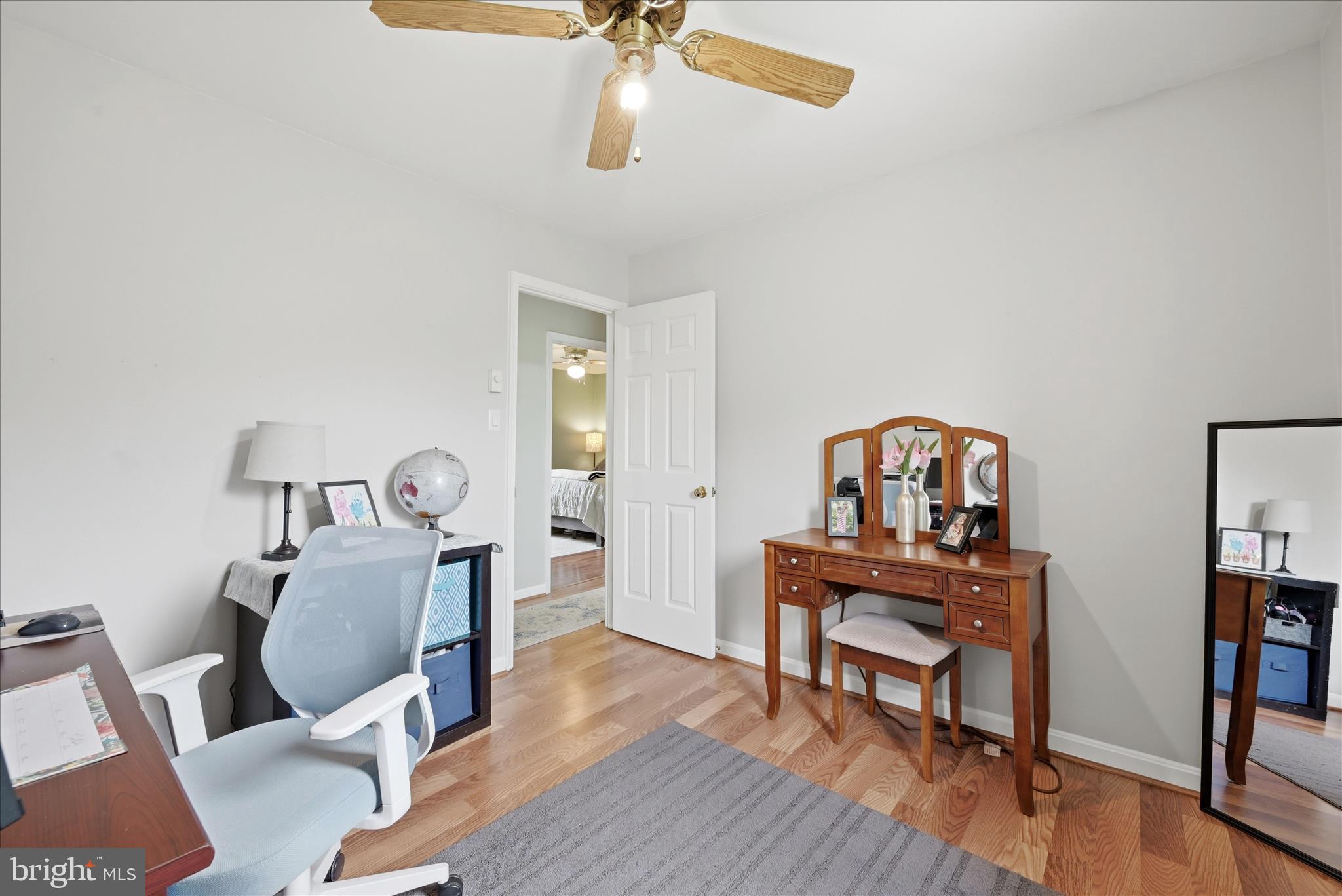 91 Granny Smith Road Linden, VA 22642 - Photo 22 of 65 a living room with furniture and a wooden floor