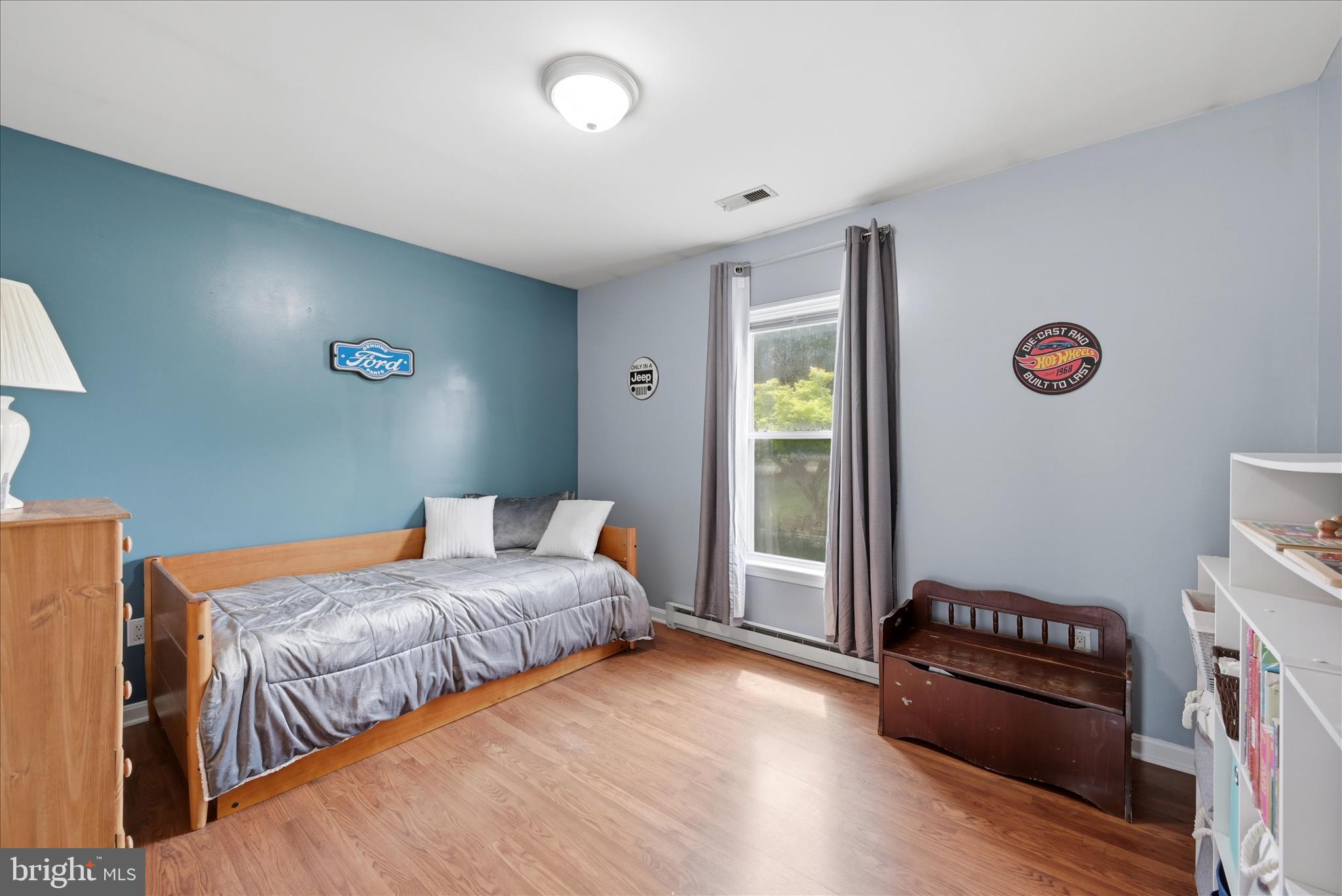 91 Granny Smith Road Linden, VA 22642 - Photo 23 of 65 a bedroom with two beds and a dresser