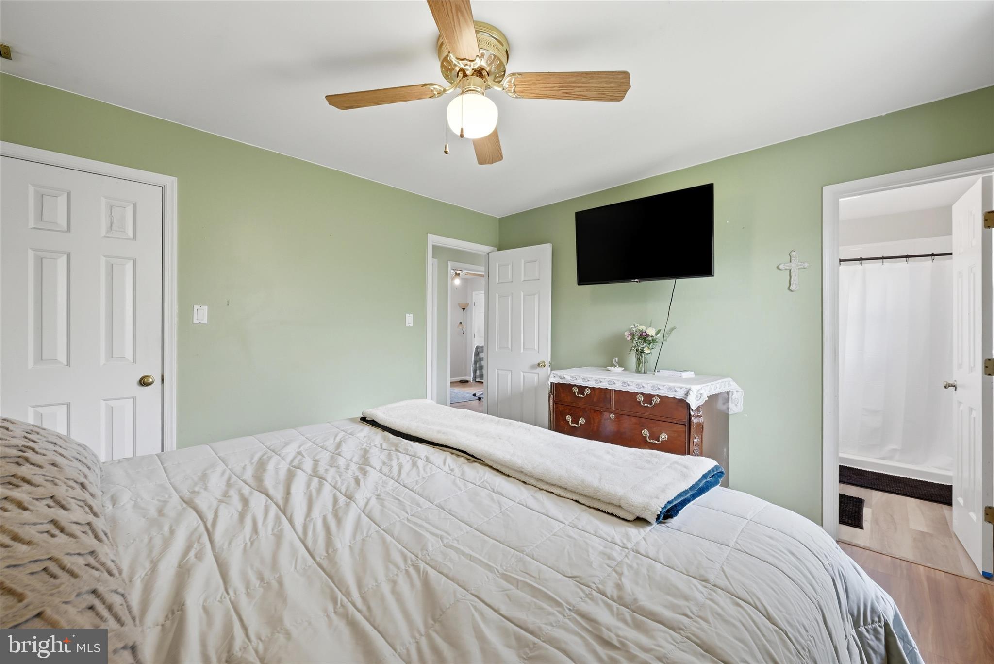 91 Granny Smith Road Linden, VA 22642 - Photo 25 of 65 a bedroom with a bed and a flat screen tv