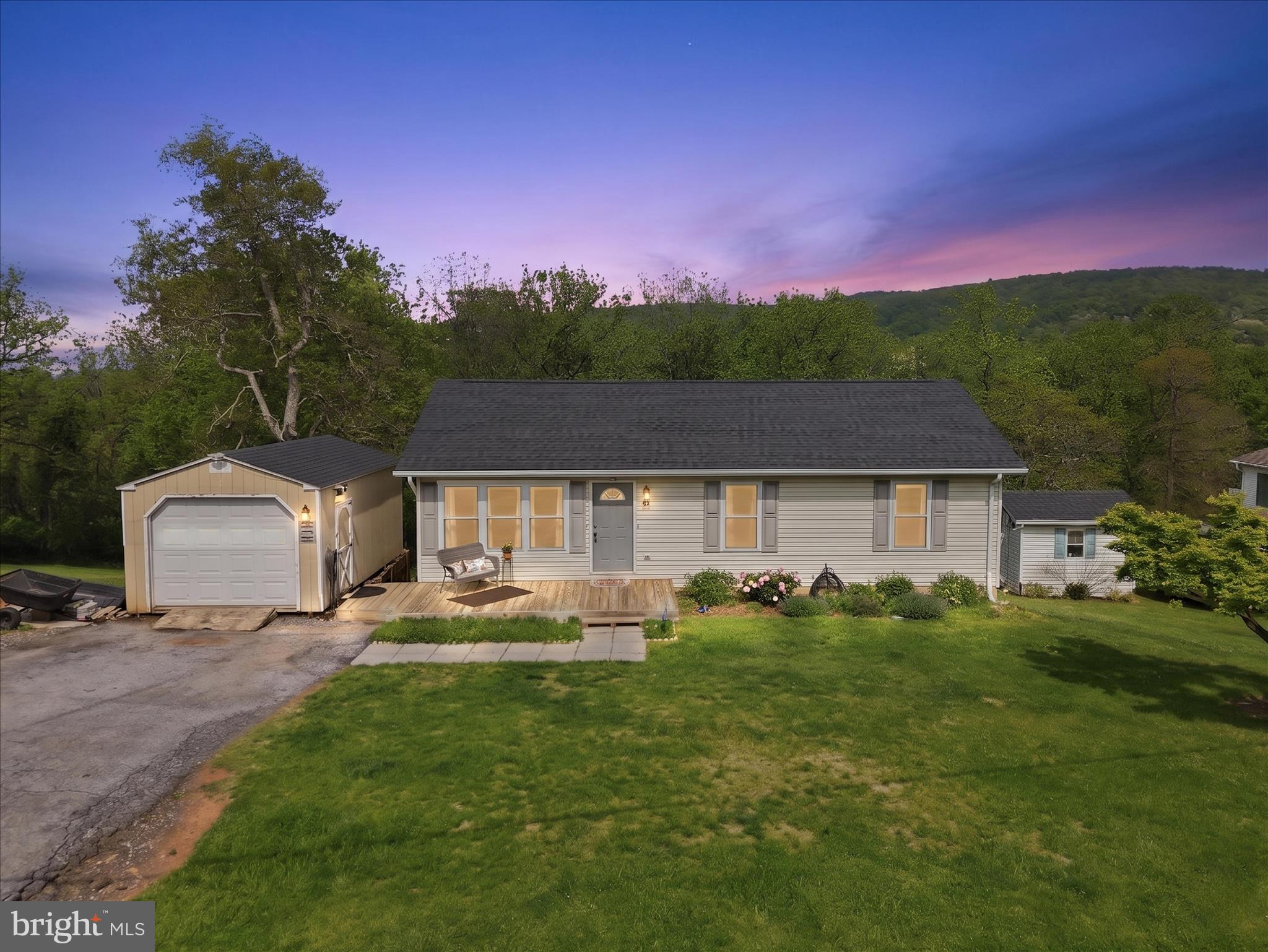 91 Granny Smith Road Linden, VA 22642 - Photo 3 of 65 a front view of a house with a garden and yard
