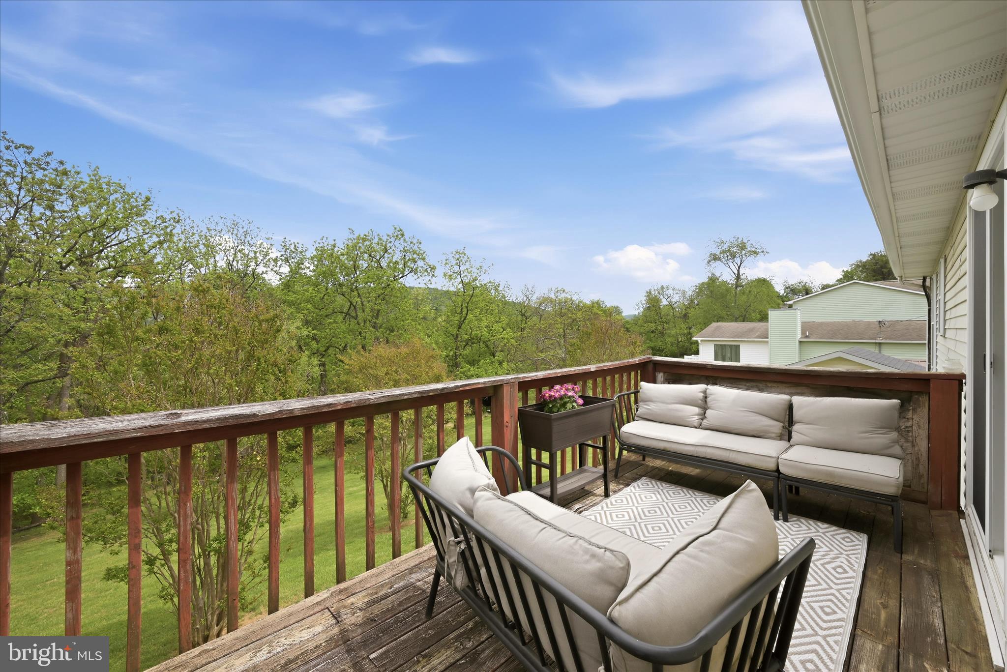 91 Granny Smith Road Linden, VA 22642 - Photo 36 of 65 a balcony with wooden floor and fence