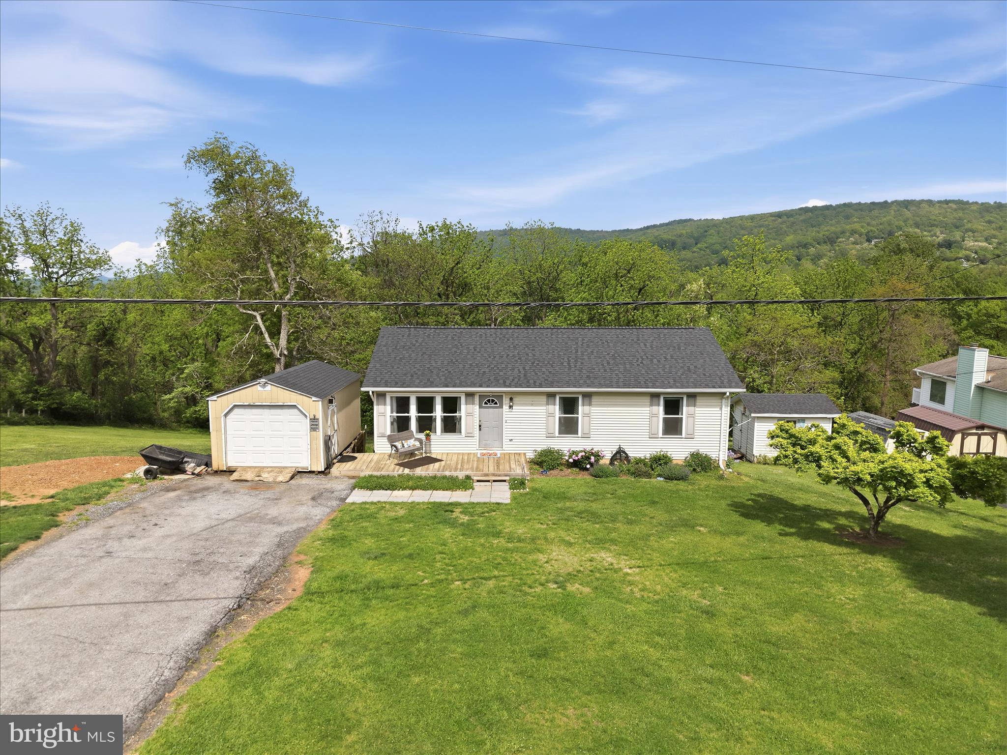 91 Granny Smith Road Linden, VA 22642 - Photo 43 of 65 a house view with a garden space