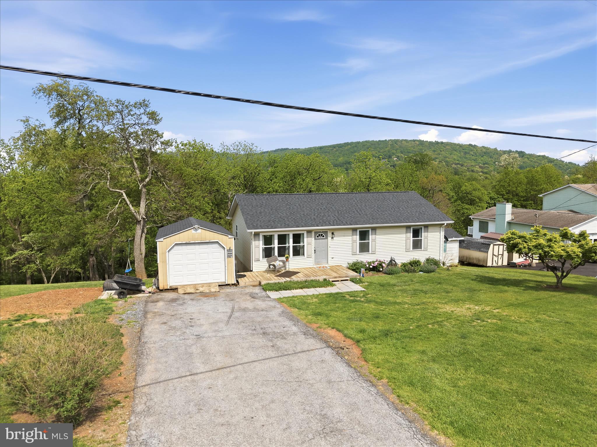 91 Granny Smith Road Linden, VA 22642 - Photo 45 of 65 a view of a house with a big yard
