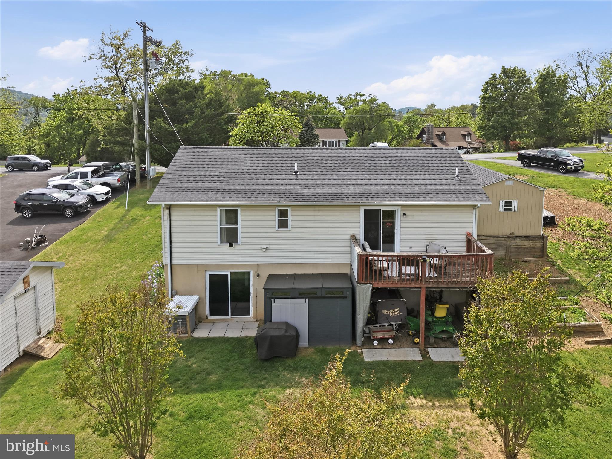 91 Granny Smith Road Linden, VA 22642 - Photo 46 of 65 a aerial view of a house with swimming pool and a chairs