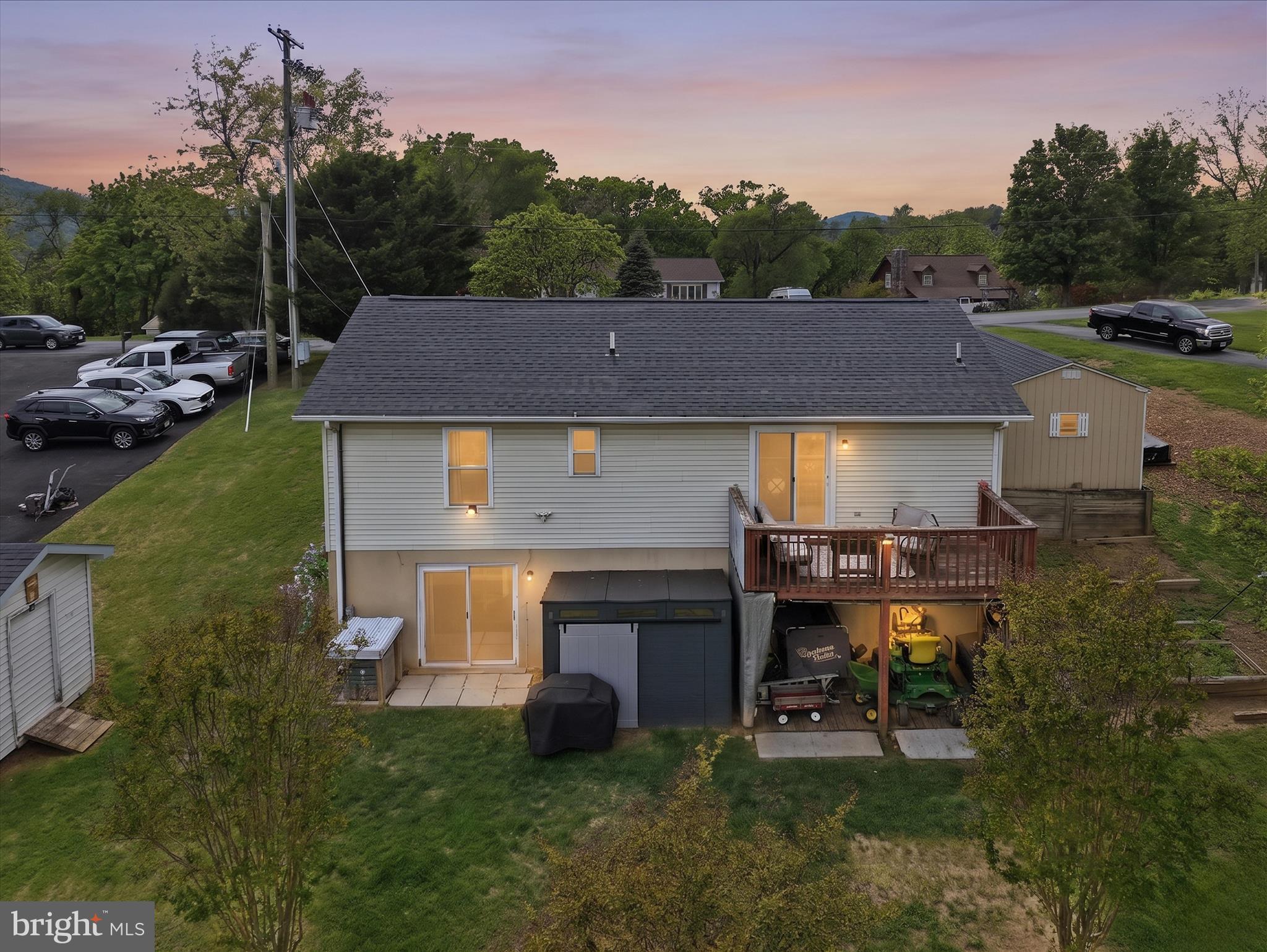 91 Granny Smith Road Linden, VA 22642 - Photo 56 of 65 a aerial view of a house with table and chairs a fire pit