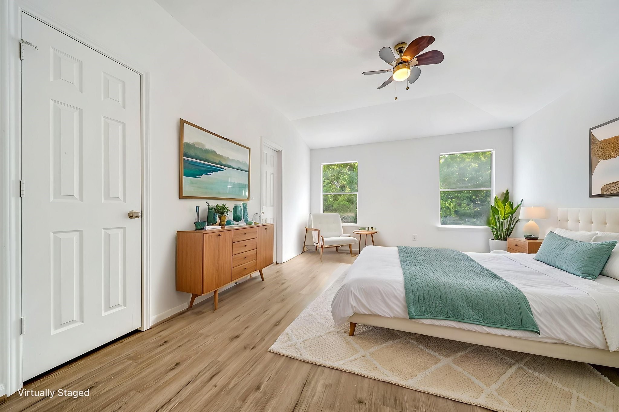 23526 Whispering Maple Drive Spring, TX 77373 - Photo 14 of 26 a bedroom with a bed and a chandelier