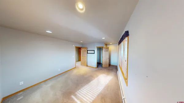 a view of a livingroom with a staircase