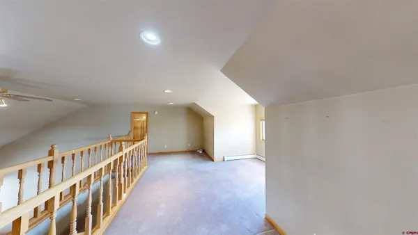a view of hallway with stairs