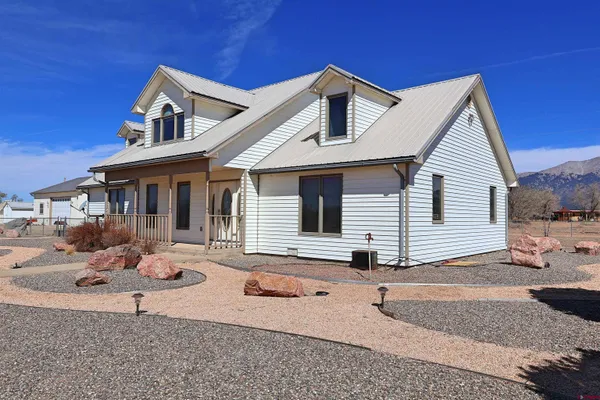a front view of a house with patio