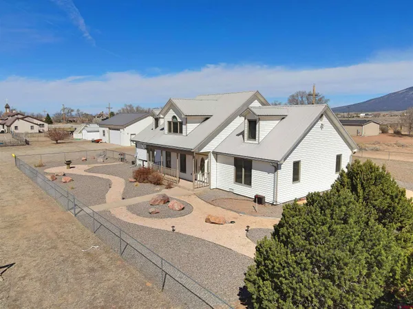 a view of a house with a garage