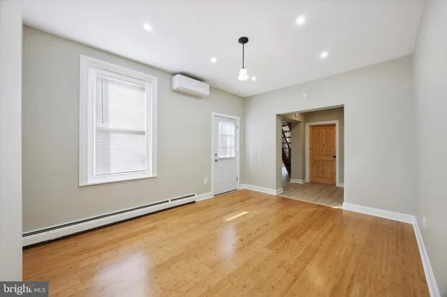 a kitchen with stainless steel appliances granite countertop a stove and cabinets