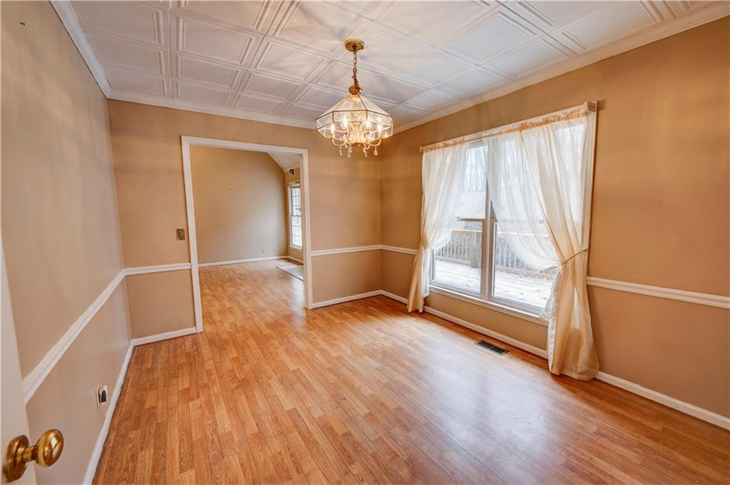 197 Saddlebrook Drive Southeast Calhoun, GA 30701 - Photo 25 of 71 wooden floor in an empty room with a window