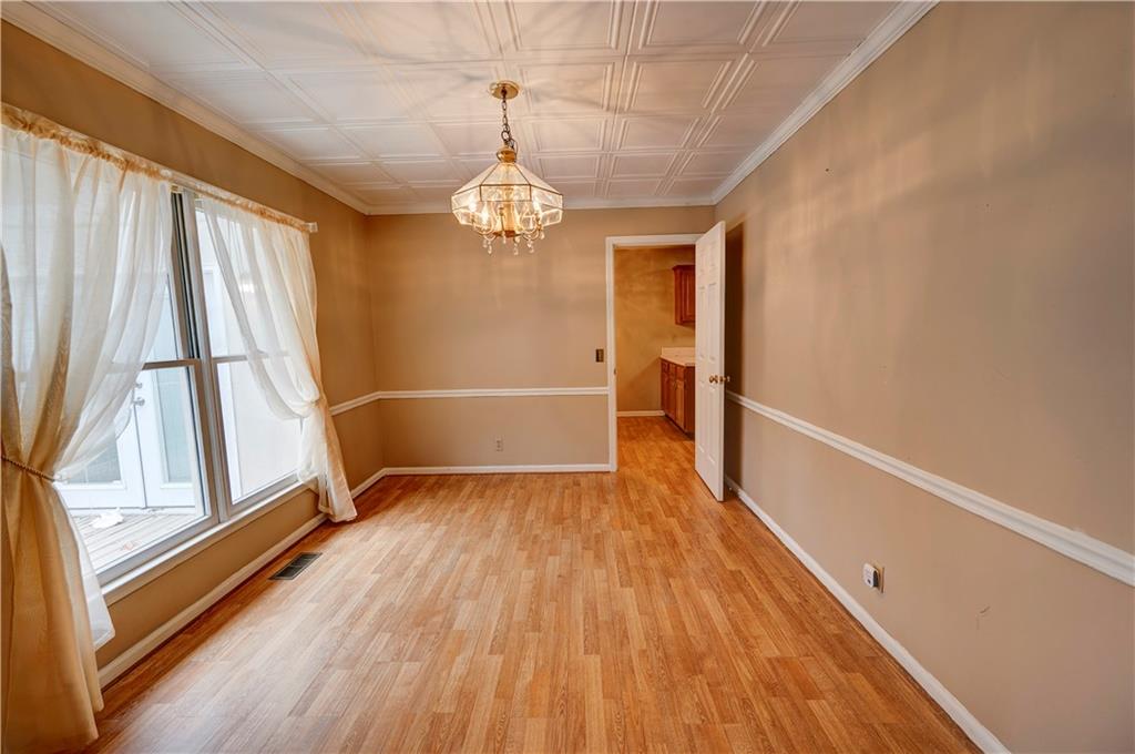 197 Saddlebrook Drive Southeast Calhoun, GA 30701 - Photo 26 of 71 a view of empty room with wooden floor and window