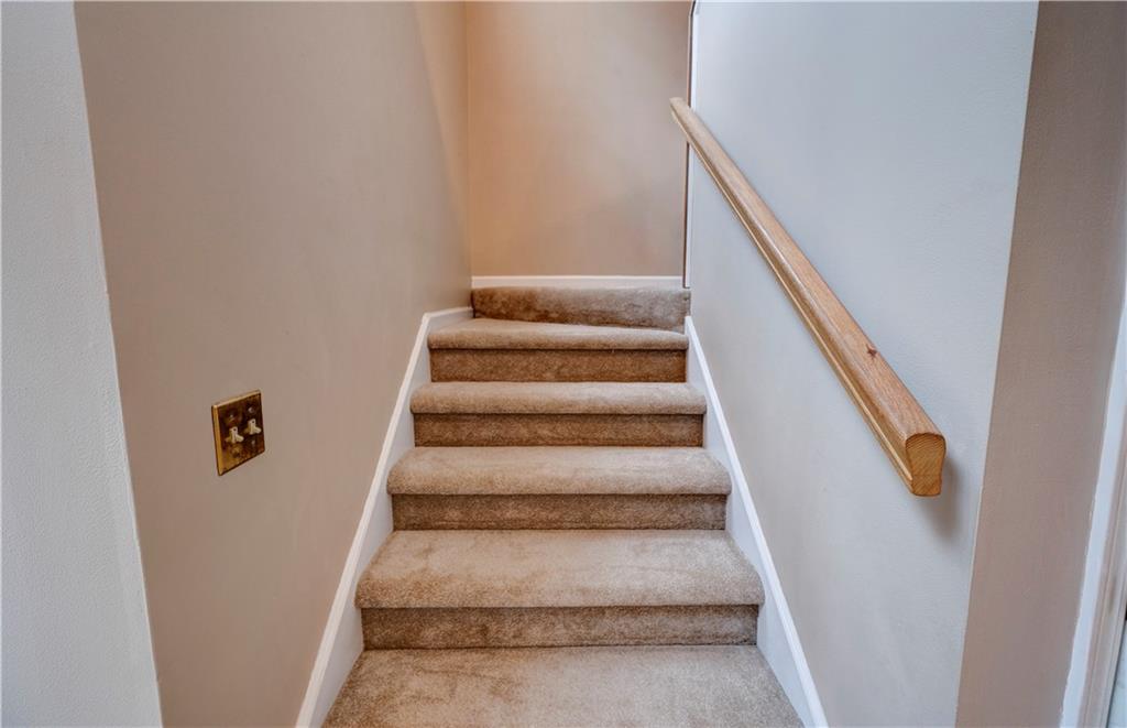 197 Saddlebrook Drive Southeast Calhoun, GA 30701 - Photo 44 of 71 a view of staircase with white walls