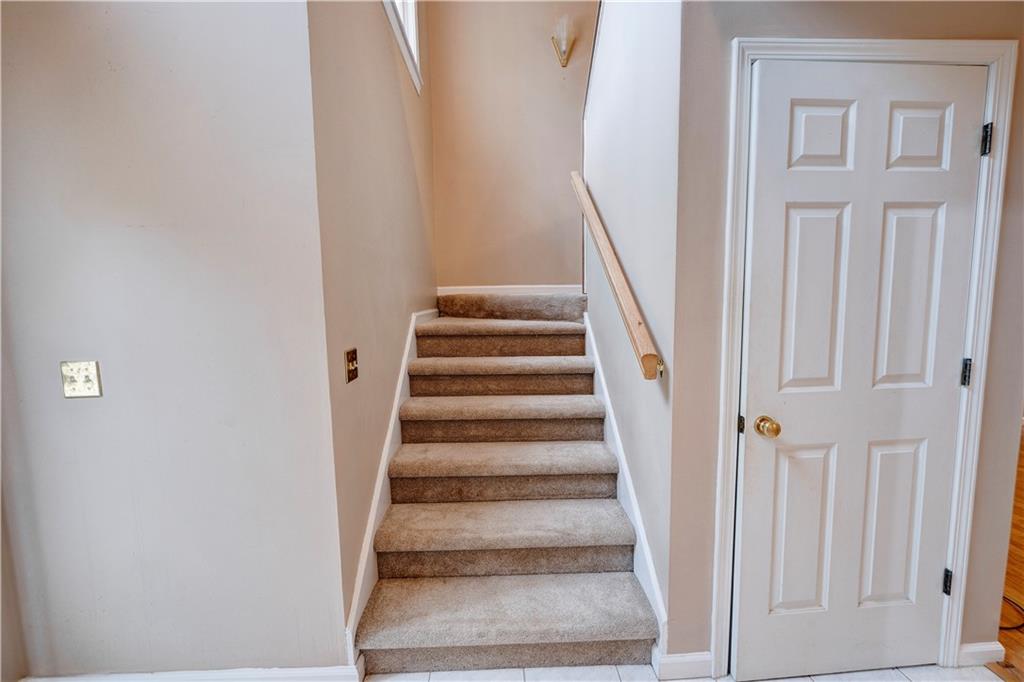 197 Saddlebrook Drive Southeast Calhoun, GA 30701 - Photo 45 of 71 a view of staircase with railing and white walls