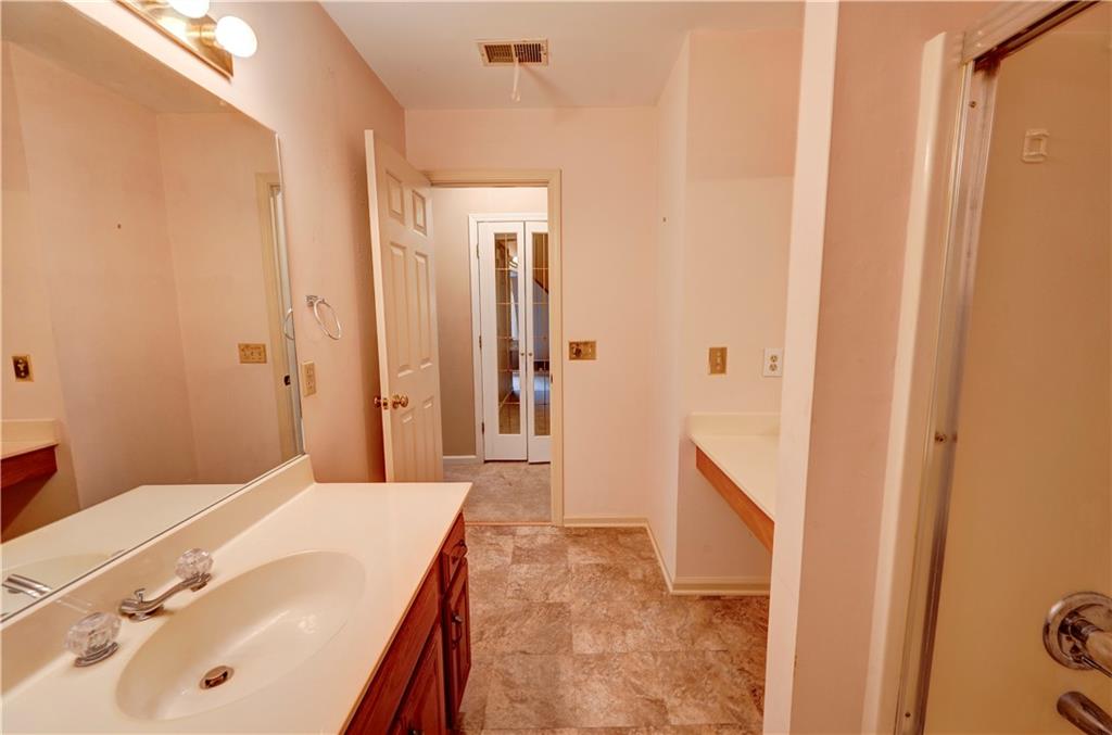 197 Saddlebrook Drive Southeast Calhoun, GA 30701 - Photo 50 of 71 a spacious bathroom with a sink and a mirror