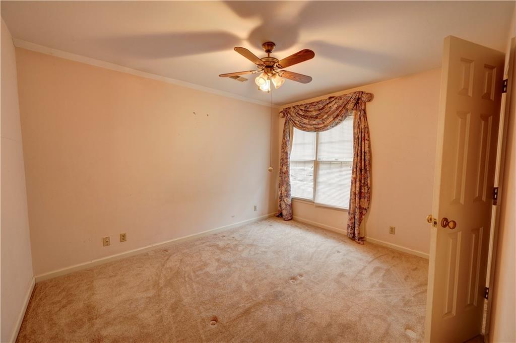 197 Saddlebrook Drive Southeast Calhoun, GA 30701 - Photo 56 of 71 an empty room with windows and fan
