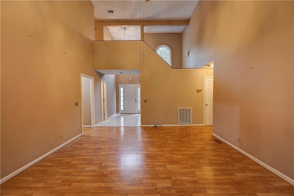 197 Saddlebrook Drive Southeast Calhoun, GA 30701 - Photo 8 of 71 a view of a hallway with wooden floor