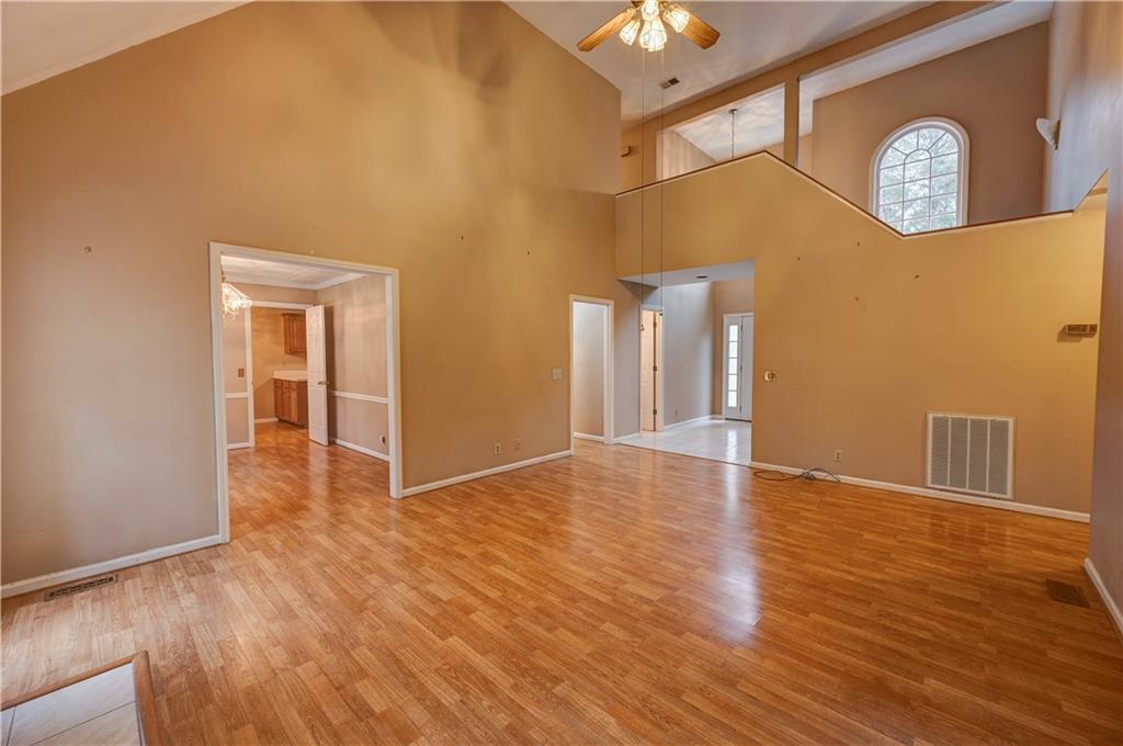 197 Saddlebrook Drive Southeast Calhoun, GA 30701 - Photo 9 of 71 a view of an empty room with wooden floor