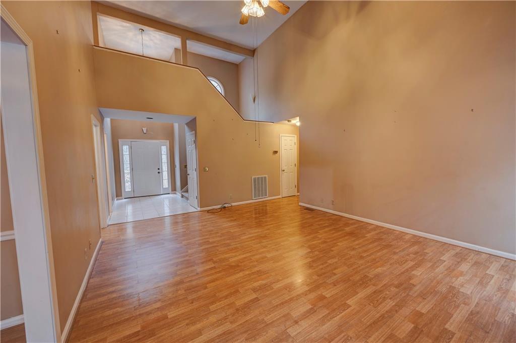 197 Saddlebrook Drive Southeast Calhoun, GA 30701 - Photo 10 of 71 a view of empty room with wooden floor