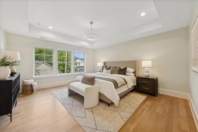 a bed room with a bed and a couch