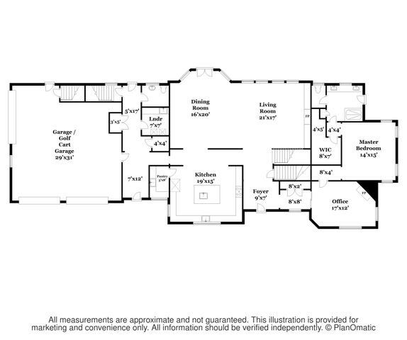 a front view of a house with a yard table and chairs