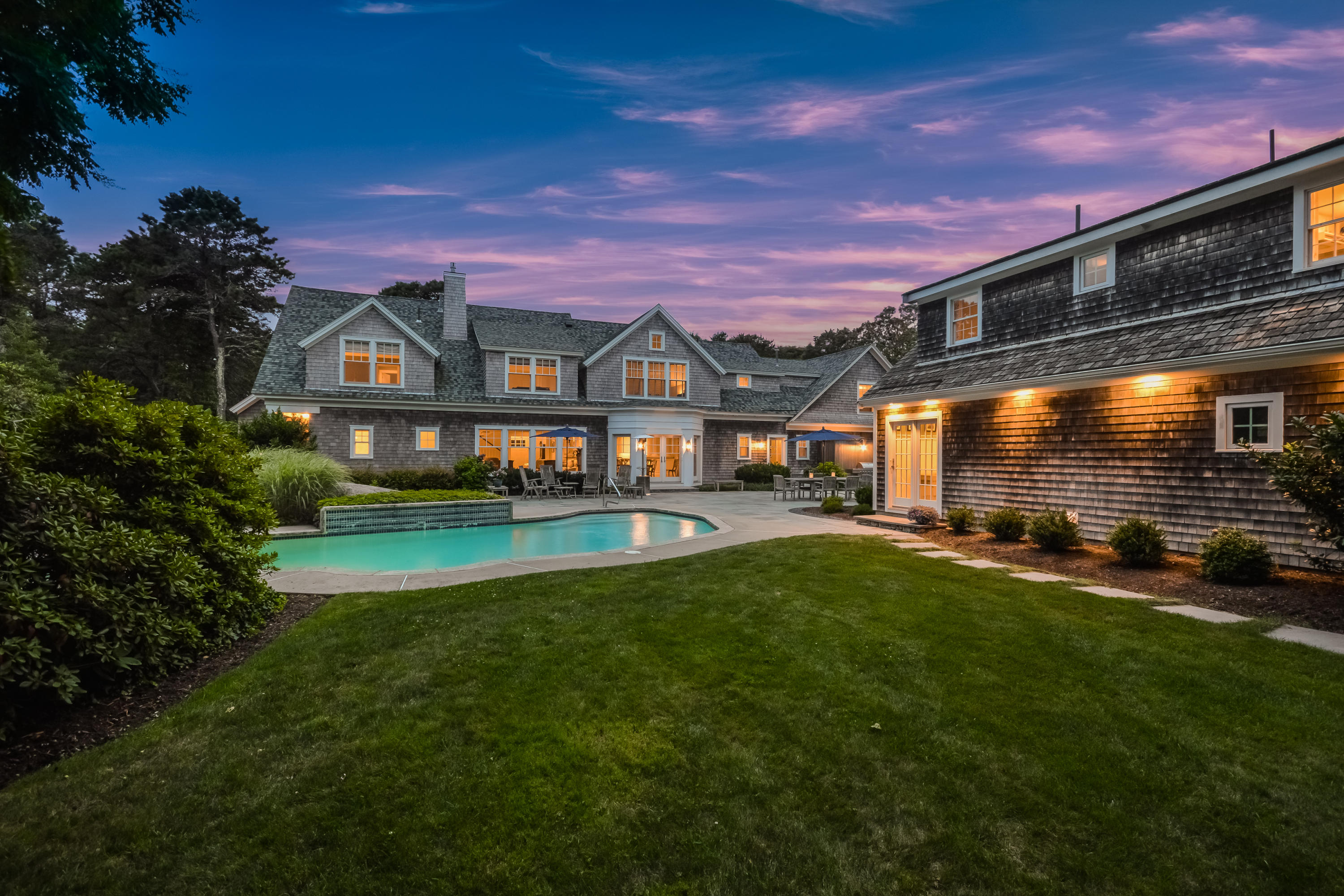 563 Scraggy Neck Road Cataumet, MA 02534 - Photo 30 of 35 058-photo-twilight-rear-view-6123625
