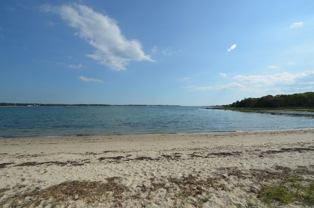 a picture of a rug with a white wall and white