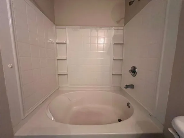 a bathroom with a bathtub