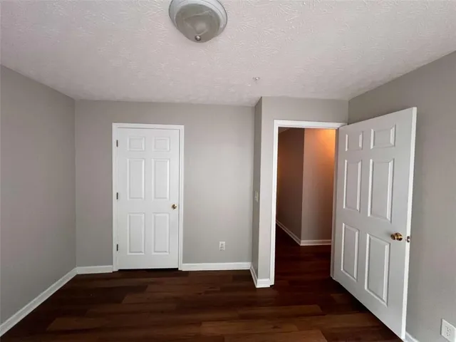 a view of a livingroom with wooden floor