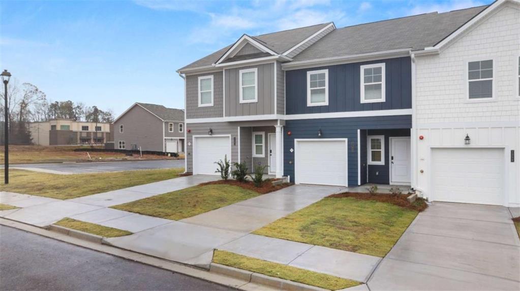 9452 Maple Grv Lane Jonesboro, GA 30238 - Photo 1 of 23 a front view of a house with yard