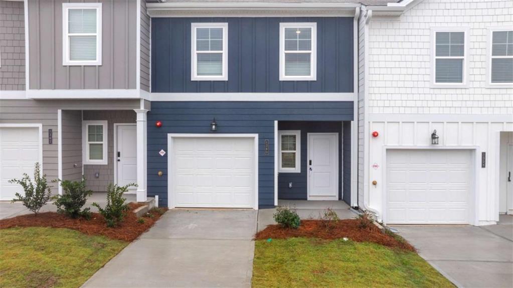 9452 Maple Grv Lane Jonesboro, GA 30238 - Photo 4 of 23 a front view of a house having yard