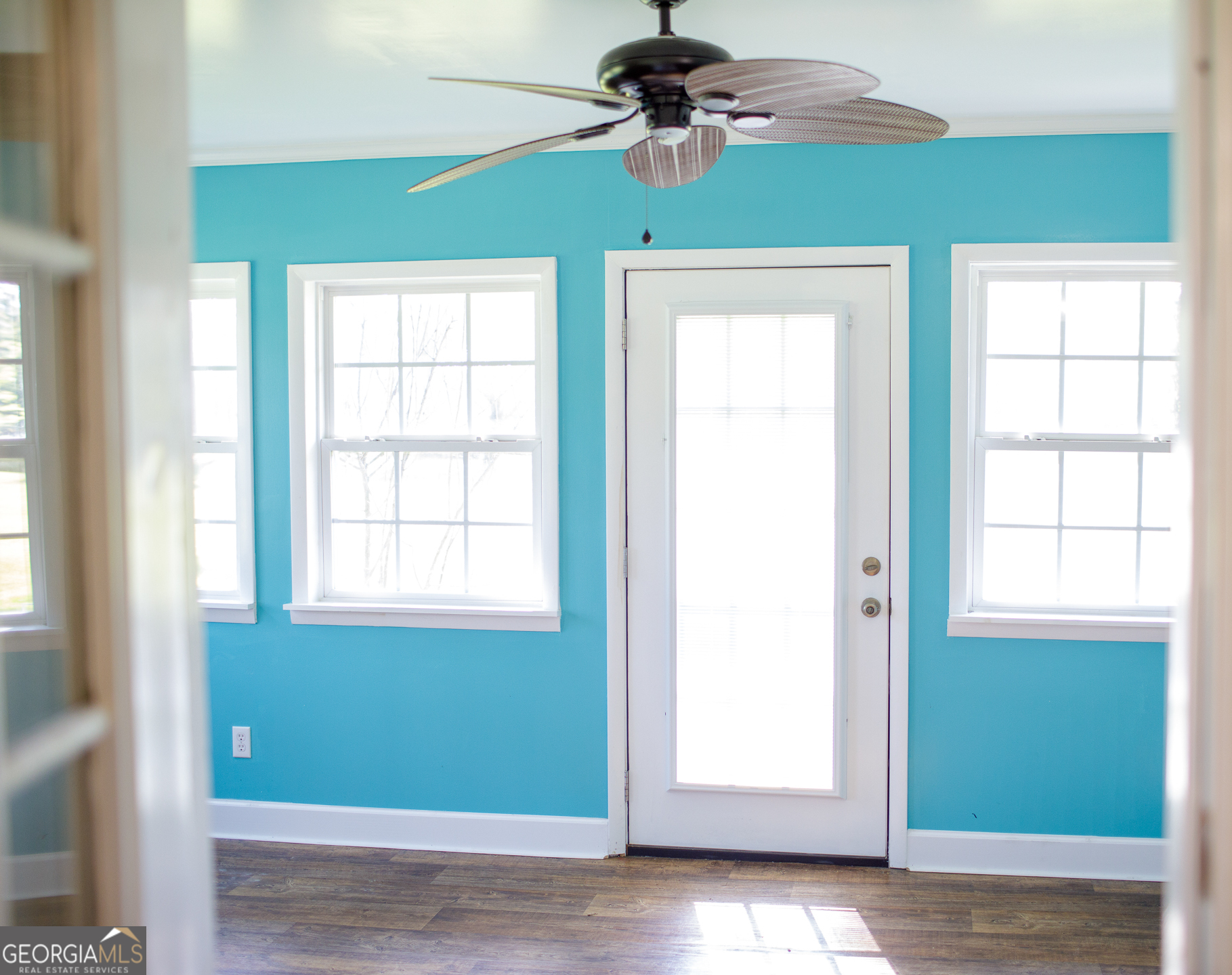 2110 Ware Street Blackshear, GA 31516 - Photo 32 of 57 a view of a room that has a window and a ceiling fan