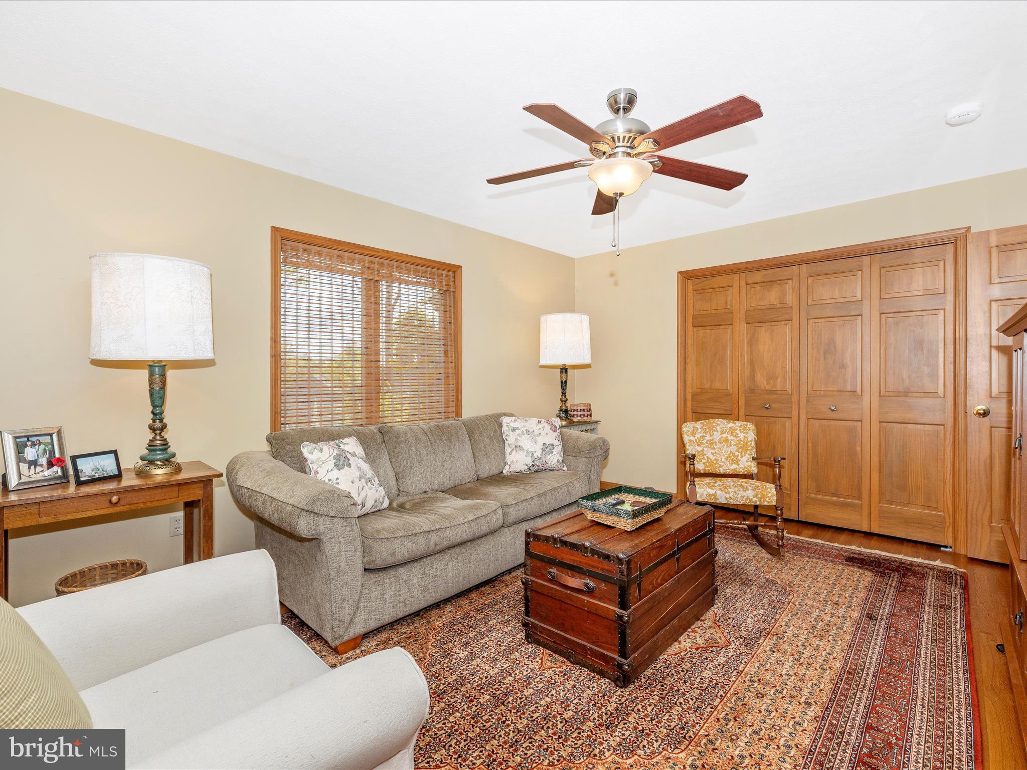8560 Rocky Springs Road Frederick, MD 21702 - Photo 21 of 50 a living room with furniture and a large window