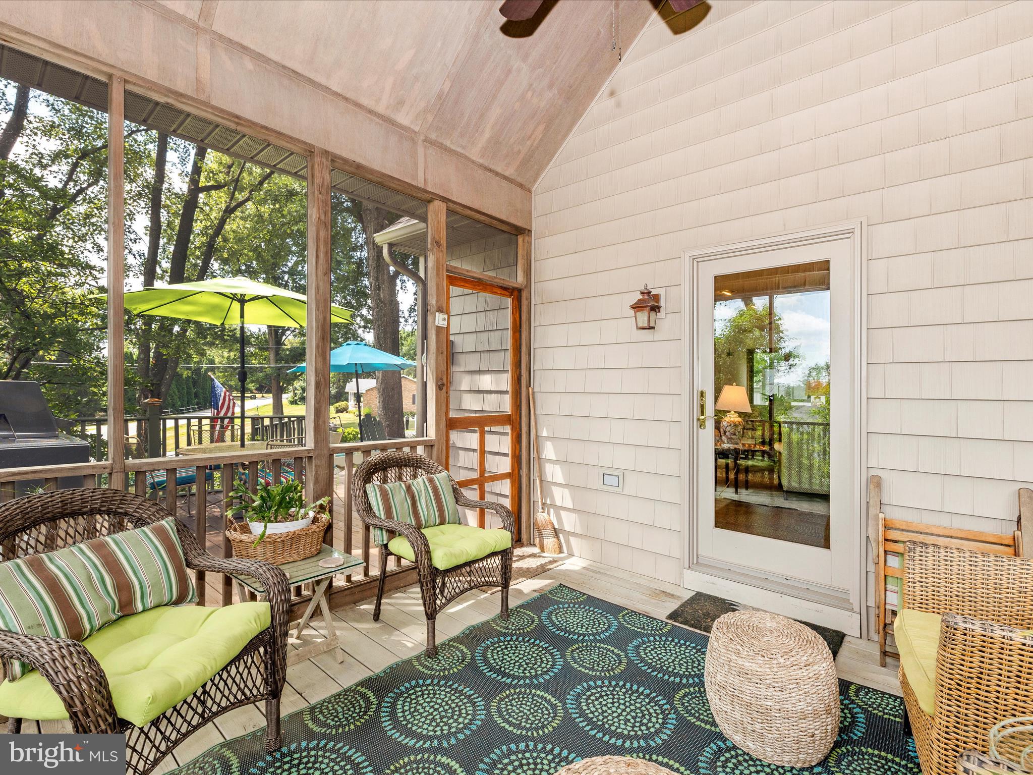 8560 Rocky Springs Road Frederick, MD 21702 - Photo 26 of 50 a balcony with furniture and a large window