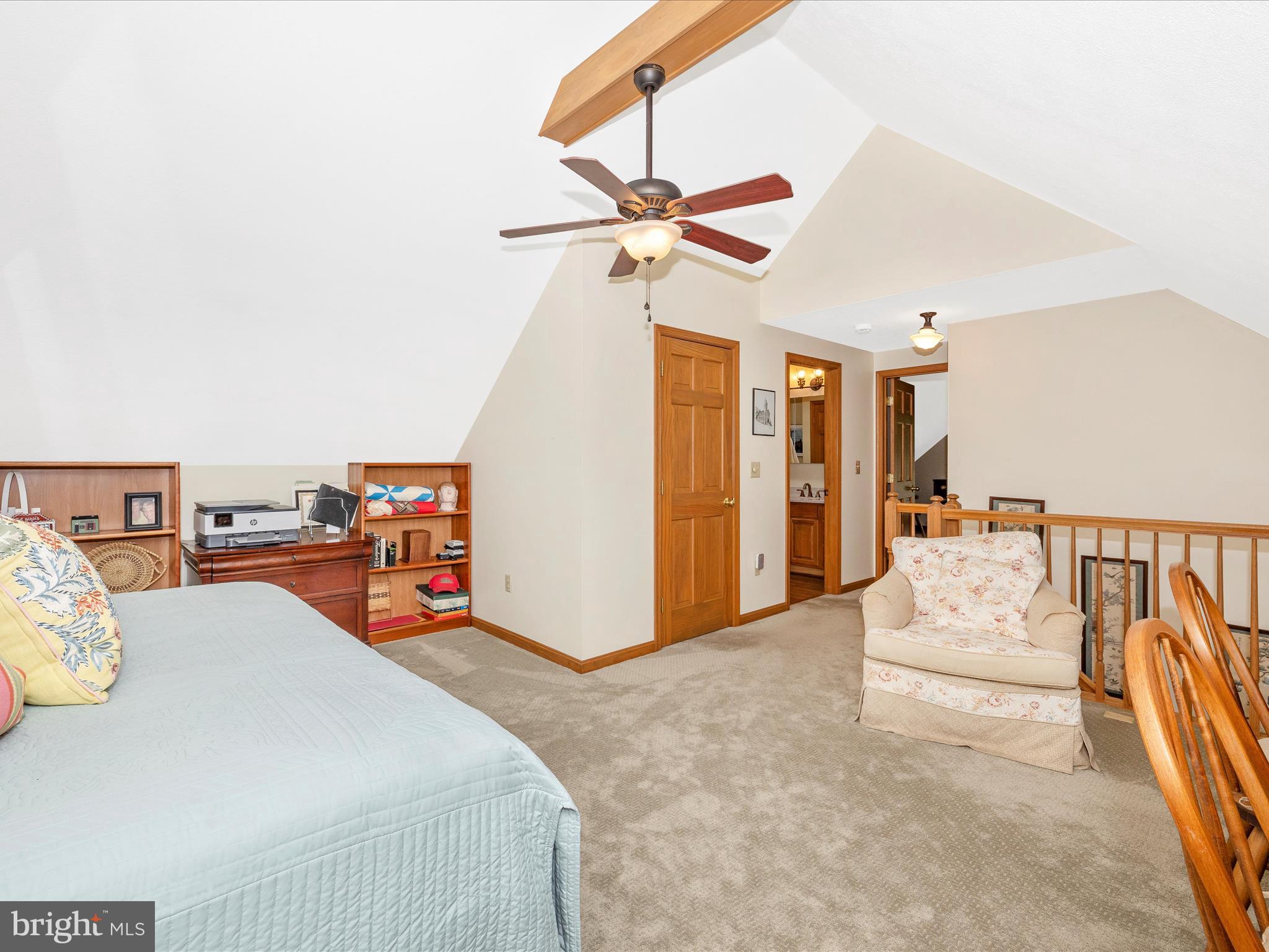 8560 Rocky Springs Road Frederick, MD 21702 - Photo 31 of 50 a bedroom with furniture and a chandelier