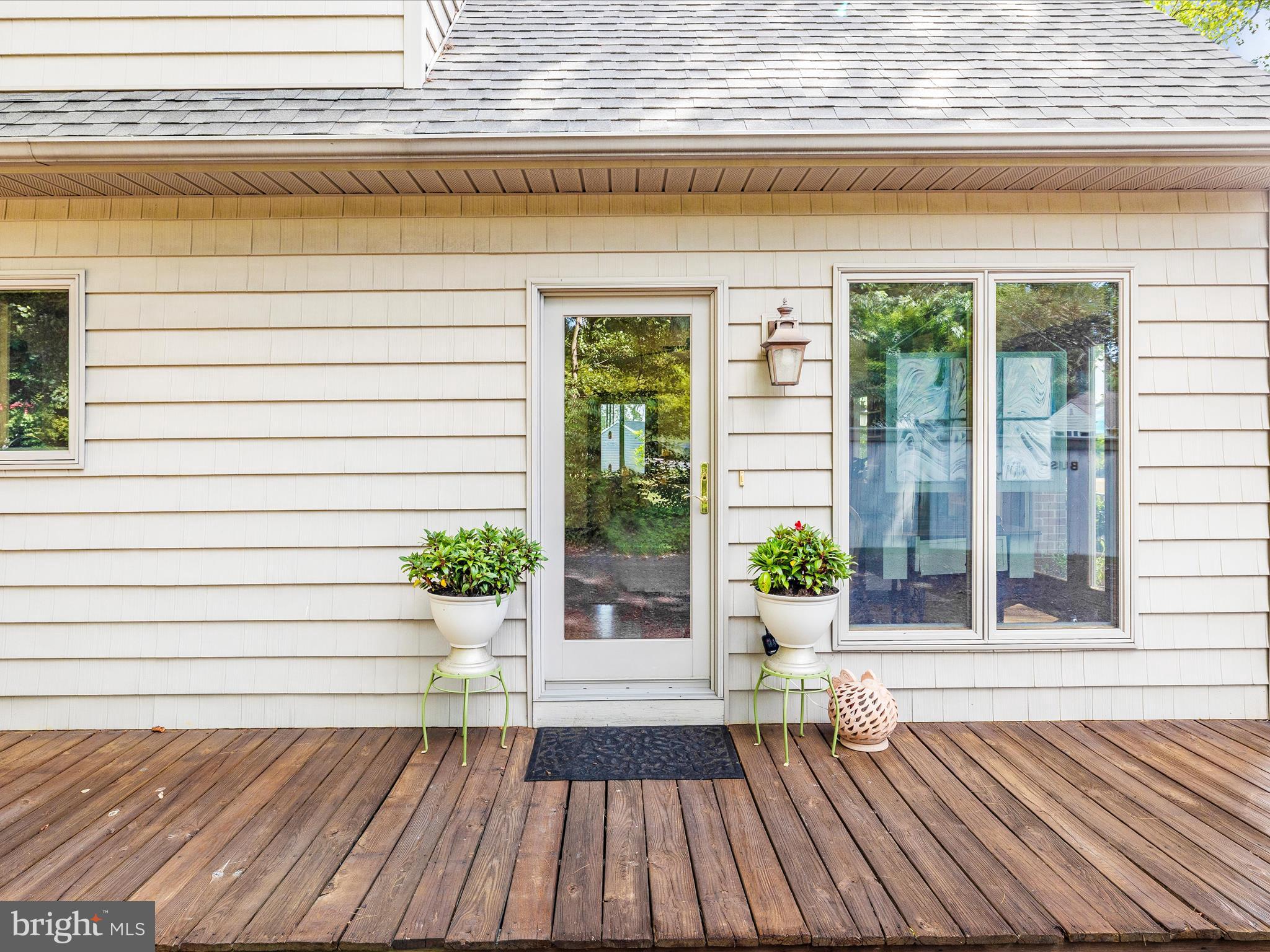 8560 Rocky Springs Road Frederick, MD 21702 - Photo 4 of 50 a view of a house with a potted plant