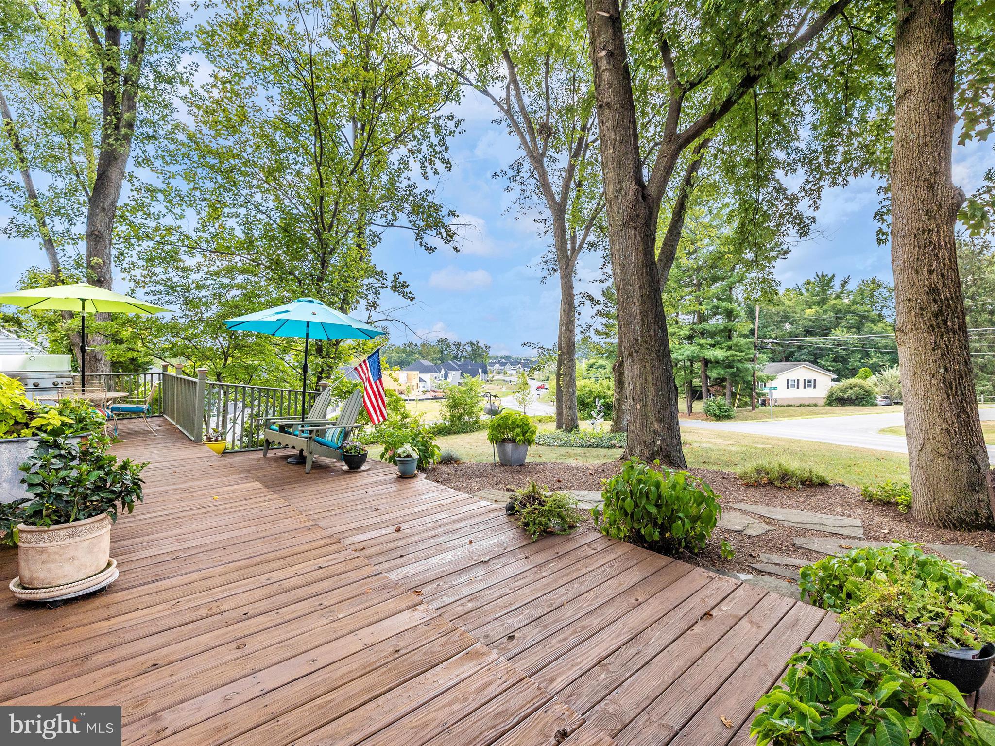 8560 Rocky Springs Road Frederick, MD 21702 - Photo 43 of 50 a view of a backyard with sitting area and furniture