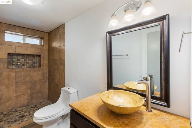 a picture of a bathroom with a sink