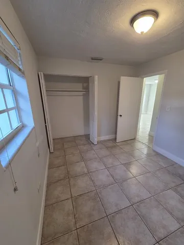 a view of an empty room and entrance