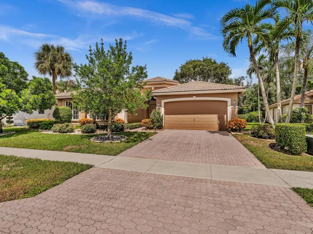 a lobby with furniture and floor to ceiling window